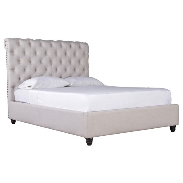 tufted upholstered cream fabric bed