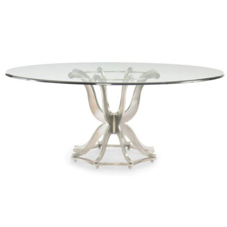 Round dining table with glass top side view. Its base is truly unique: eight serpentine shaped polished aluminum "arms" reach upward to support the round 3/4 inch glass top, while eight "legs" reach downward to rest on a concave-sided, octagonal base.
