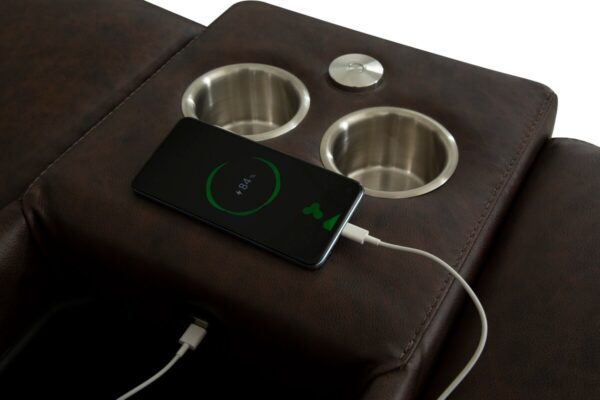 closeup of optional mid seat console showing stainless steel cupholders and usb charging port