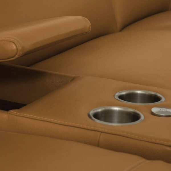 camel colored leather sectional center console with stainless steel cupholders and storage