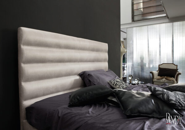 light gray leather horizontal panel bed staged