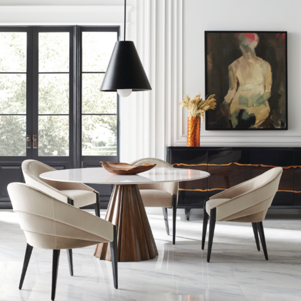 All Natural dining table shows finishes of table and elegant chairs from Caracole.