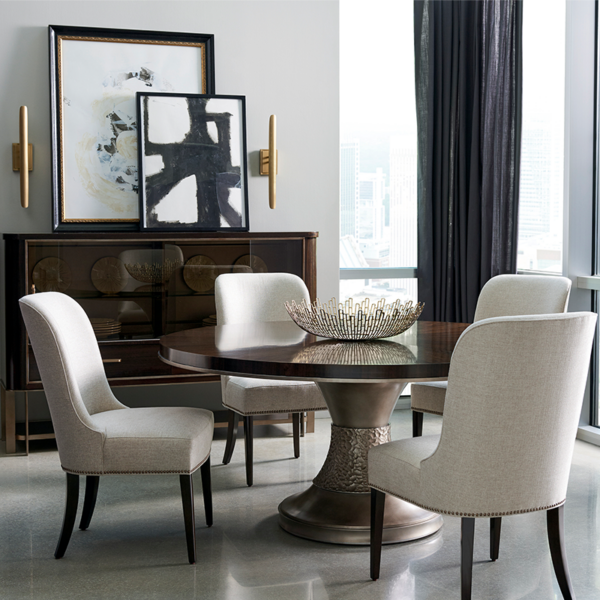 Moderne dining table Room shot all elegant chairs and showing a sideboard with dining table by Caracole