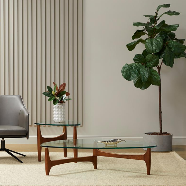 Ledell coffee table shown in a living room with a side table same model