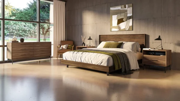 BDI USA's modern walnut platform bed frame in a large contemporary house with concrete floors at dusk