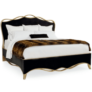 The black ribbon bed by Caracole in a black velvet fabric with a gold finish wood trim in a ribbon like form.